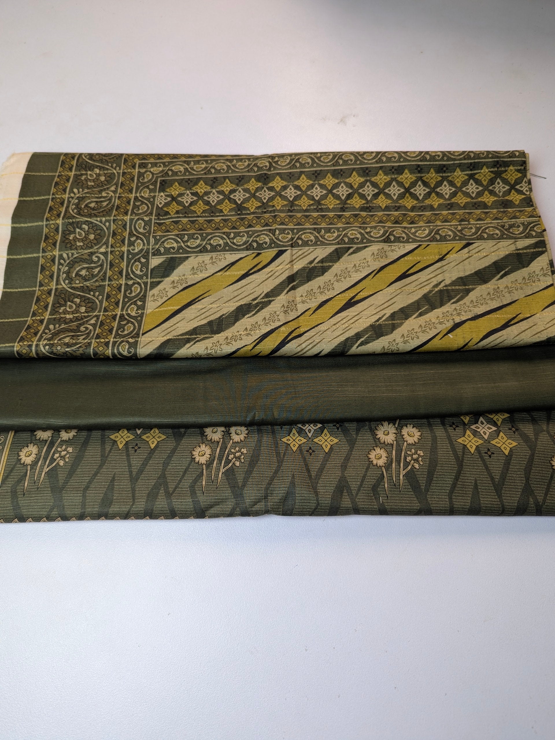 Collection of patterned fabric swatches on a white background