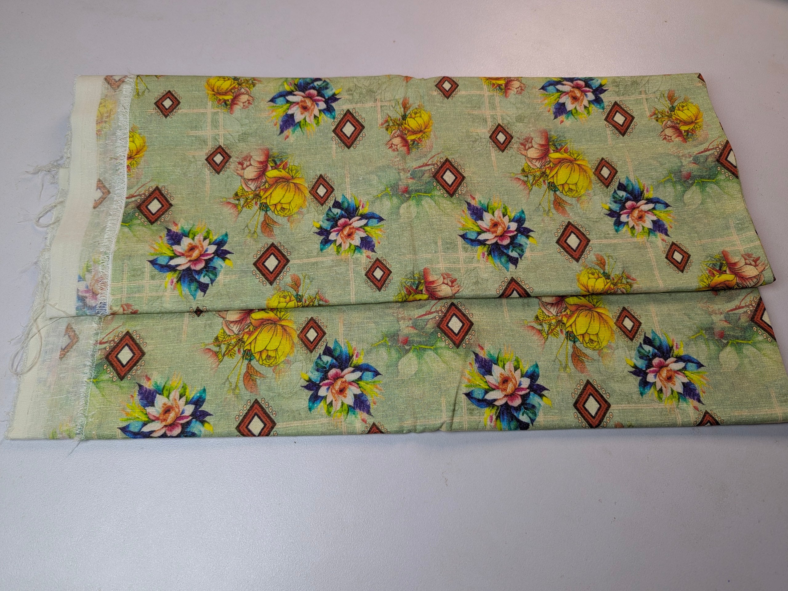 Two floral-patterned bags on a white background