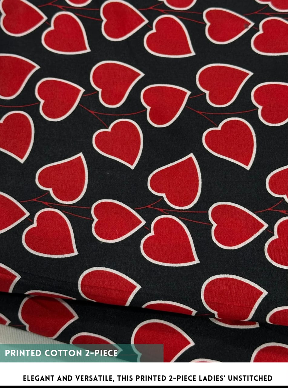 Red heart pattern on black fabric with text about printed cotton 2-piece.