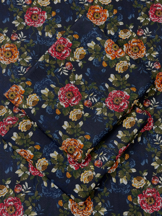 Floral patterned fabric with colorful flowers on a dark blue background